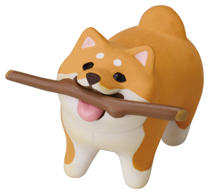 いい感じの棒をゲットした犬